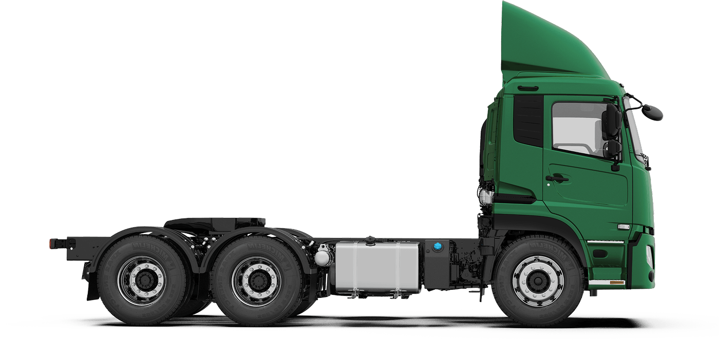 Green semi-truck cab with no trailer, side view.
