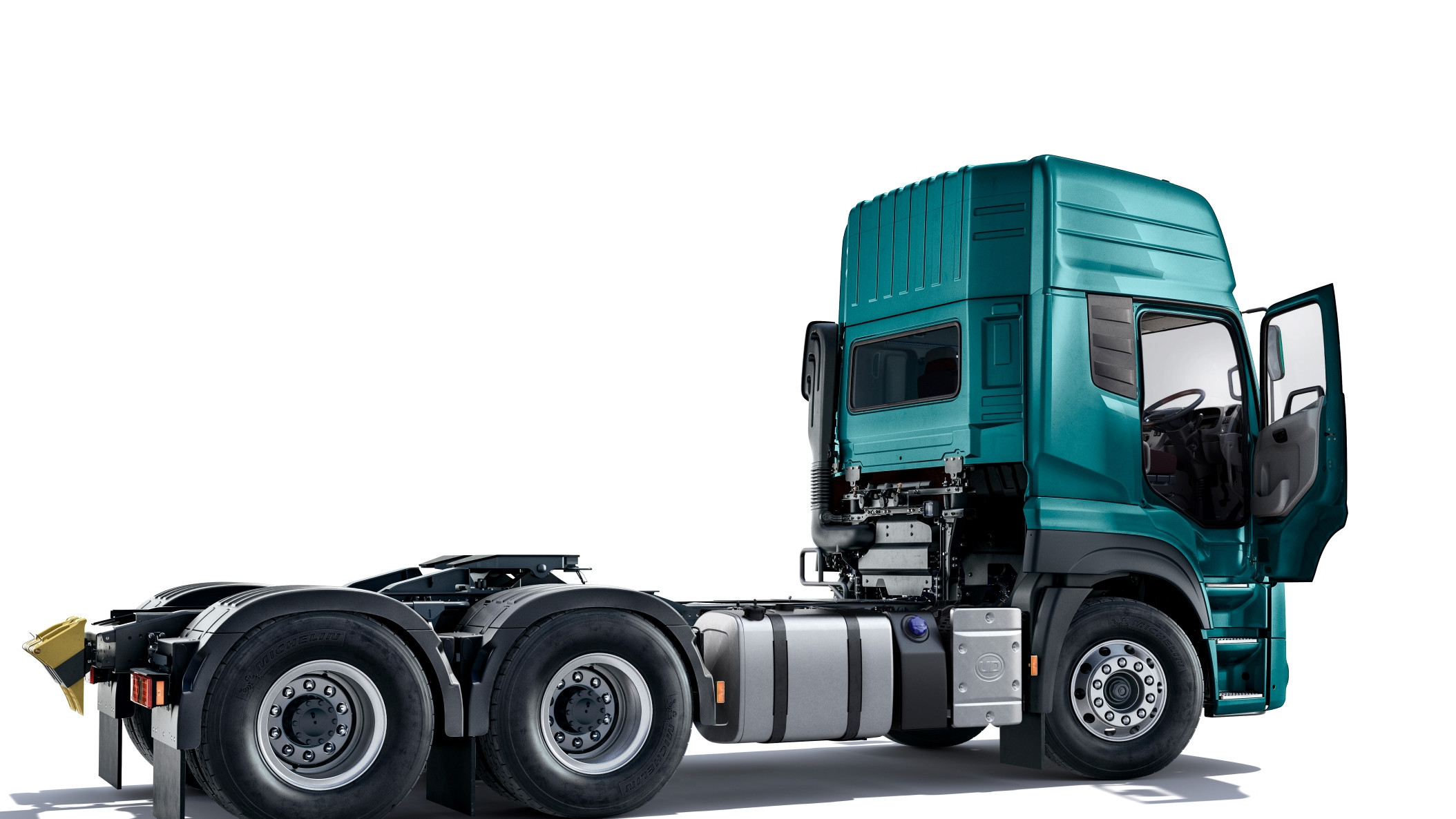 Lori ya kijani yenye mlango mmoja umefunguliwa, haijabeba mzigo.